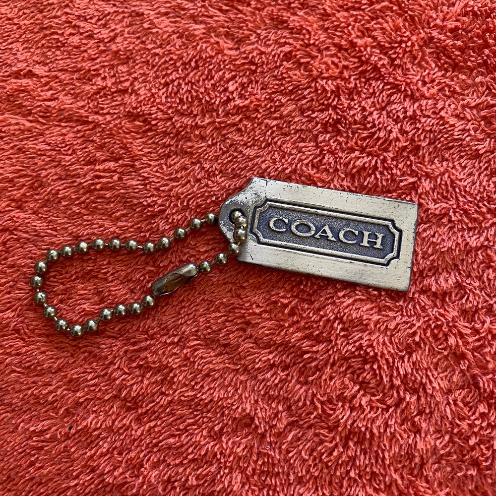 Vintage 1990 Coach Brass keychain or purse charm.